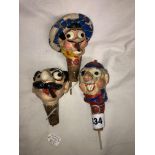 THREE NOVELTY PAPIER MACHE AND CORK BOTTLE STOPPERS IN THE FORM OF GROUCHO MARKS AND KINKY B