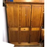 PINE TRIPLE DOOR WARDROBE 190CM H X 142CM W X 60CM D