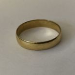 18CT YELLOW GOLD WEDDING BAND STAMPED 750 SIZE V 3.