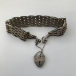 SILVER FOUR GATE BRACELET WITH HEART PADLOCK AND SAFETY CHAIN 1.