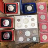 FOUR CASED CANADIAN DOLLARS,