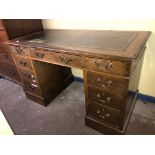 EDWARDIAN OAK NINE DRAWER KNEEHOLE DESK WITH INSET GREEN LEATHER SCIVER (DIMENSIONS-W.119CM,H.