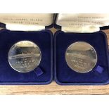 TWO CASED QUEEN ELIZABETH II SOLID NICKEL SILVER LIMITED EDITION MEDALLIONS AND A WEISS QUARTZ