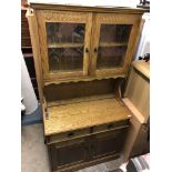 OAK LEADED GLAZED SMALL DRESSER WITH CARVED DECORATION (DIMENSIONS-W.94CM,H.184CM,D.