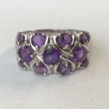 BOXED 9CT WHITE GOLD AND AMETHYST STONE KEEPER RING SIZE T 5G APPROX