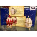 TWO BOXED ENAMEL IMPERIAL RUSSIAN EGG MODELS
