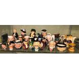 SHELF OF POTTERY TOBY JUGS, ROYAL DOULTON AND KIRKHAM CHARACTER JUGS INCLUDING GRANNY,