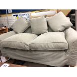 TWO SEATER LINEN SOFA WITH GREEN COVERS AND SCATTER CUSHIONS