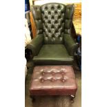 BOTTLE GREEN BUTTON BACKED FAUX LEATHER WING ARMCHAIR ON CABRIOLE LEGS AND BROWN LEATHERETTE FOOT