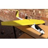 YELLOW AND WHITE MODEL PLANE