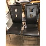 FOUR BLACK STITCHED HIGH BACK CHROMIUM DINING CHAIRS