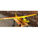 SCALE MODEL OF SUPER 60 YELLOW AND RED PLANE