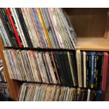 THREE SHELVES OF VINYL LPS,