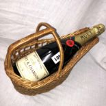 BOTTLE OF MOET & CHANDON CHAMPAGNE IN WICKER BASKET