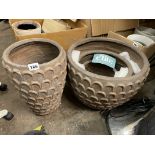 GRADUATED SET OF HORSE SHOE PATTERN PLANTERS AND A MATCHING TALL PLANTER