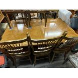 OAK FARMHOUSE STYLE EXTENDING DINING TABLE AND SIX SPINDLE BACK DINING CHAIRS