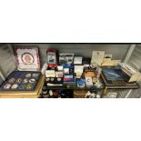SHELF OF MISCELLANEOUS MODERN COLLECTIBLE TITANIC MEMORABILIA INCLUDING CASED ENAMELED MEDALLIONS,