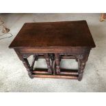 OAK JACOBEAN REVIVAL STYLE NEST OF THREE TURNED LEG TABLES