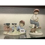 TWO LLADRO FIGURE GROUPS - BOYS WITH PUPPIES (5451 ON ONE FIGURE)