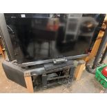 SONY BRAVIA MOUNTED TV ON STAND WITH BLUERAY DVD PLAYER AND SPEAKERS