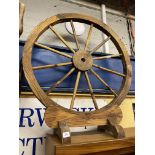 LARGE DECORATIVE WOODEN WHEEL ON STAND