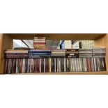 SHELF OF VARIOUS CD AND DVDS