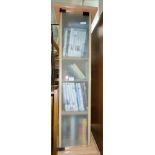 NARROW LIGHT OAK EFFECT DVD STORAGE CABINET WITH DVDS