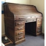 LATE 19TH CENTURY OAK TAMBOUR ROLLER SHUTTER OFFICE DESK WITH FITTED INTERIOR 130CM H X 136CM W X