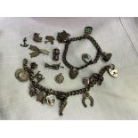 TWO SILVER CHARM BRACELETS WITH VARIOUS CHARMS, AND FIVE LOOSE CHARMS 2.