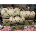 SET OF DECORATIVE DOMED LUGGAGE CASES