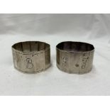 TWO SILVER NAPKIN RINGS