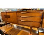 1970S TEAK SLIGHTLY BOW FRONTED SIDE BOARD