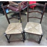 PAIR OF OAK BARLEY TWIST RAFFIA SEATED LADDER BACK CHAIRS