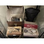 BOXED GAS MASKS AND VINTAGE HAIR CLIPPERS