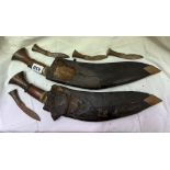 TWO SHEATHED KUKRI DAGGERS