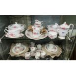 TWO SHELVES OF ROYAL STANDARD RAMBLING ROSE BONE CHINA TABLE SERVICE