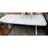 WHITE UPVC RECTANGULAR EXTENDING PATIO TABLE WITH TWO SETS OF WHITE UPVC STACKABLE CHAIRS