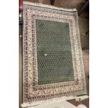 GREEN PATTERNED FRINGED CARPET 120CM X 182CM