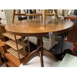 DARK STAINED PINE CIRCULAR PEDESTAL TABLE AND FIVE OAK BEECH LADDER BACK DINING CHAIRS
