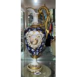 COALPORT PORCELAIN ROYAL BLUE FLORAL AND GILDED EWER VASE PAINTED WITH A LANDSCAPE VIGNETTE