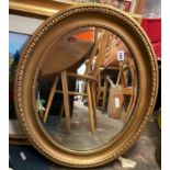 GILT OVAL EGG AND DART FRAMED MIRROR