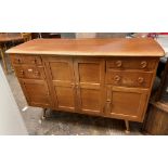 ERCOL LIGHT WOOD SIDEBOARD FITTED WITH SMALL DRAWERS