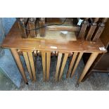 1970S TEAK NEST OF PULL OUT AND FOLDING TABLES (FADING TO TOP)
