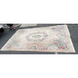 CHINESE WASH WOOLLEN FRINGED CARPET WITH CUT FLORAL DESIGN 272CM X 184CM APPROX