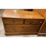 DUCAL HONEY PINE TWO OVER ONE DRAWER CHEST ON PLINTH BASE HEIGHT 61CM, WIDTH 95CM,