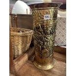 BRASS EMBOSSED CYLINDRICAL CANE STAND AND A WICKER BICYCLE PANNIER