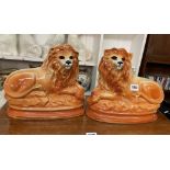 PAIR STAFFORDSHIRE RECUMBENT LIONS WITH GLASS EYES