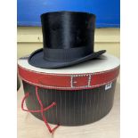 HAT BOX CONTAINING A VINTAGE SILK/MOLESKIN TOP HAT SIZE 60 BY BURTON