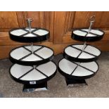 PAIR OF OVAL CHROMIUM THREE TIER PADDED DISPLAY STANDS