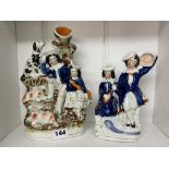 19TH CENTURY STAFFORDSHIRE FLAT BACK FIGURAL SPILL HOLDER AND A SMALLER FIGURE GROUP